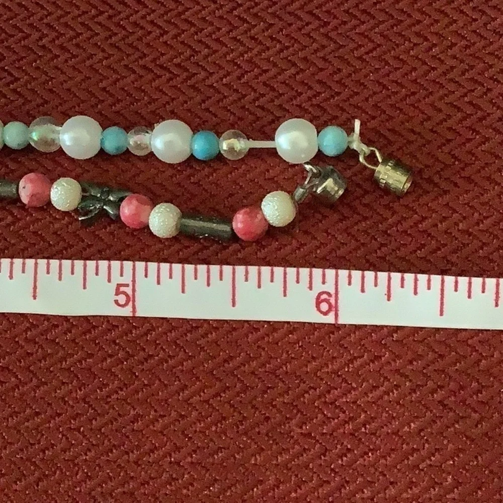 Two little girl bracelets one magnetic closure one screw back closure